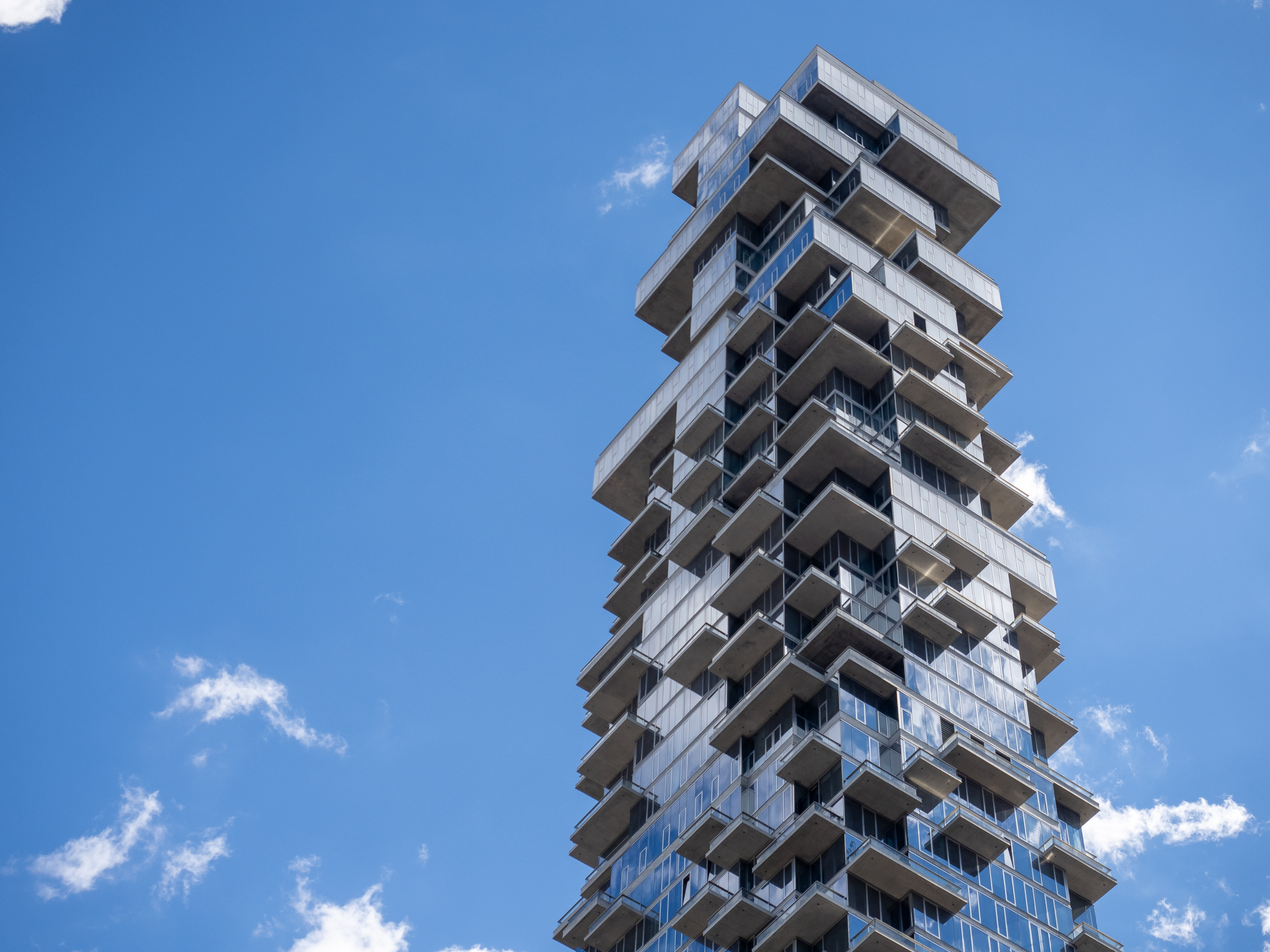 Exterior of 56 Leonard's shifting glass-and-concrete facade