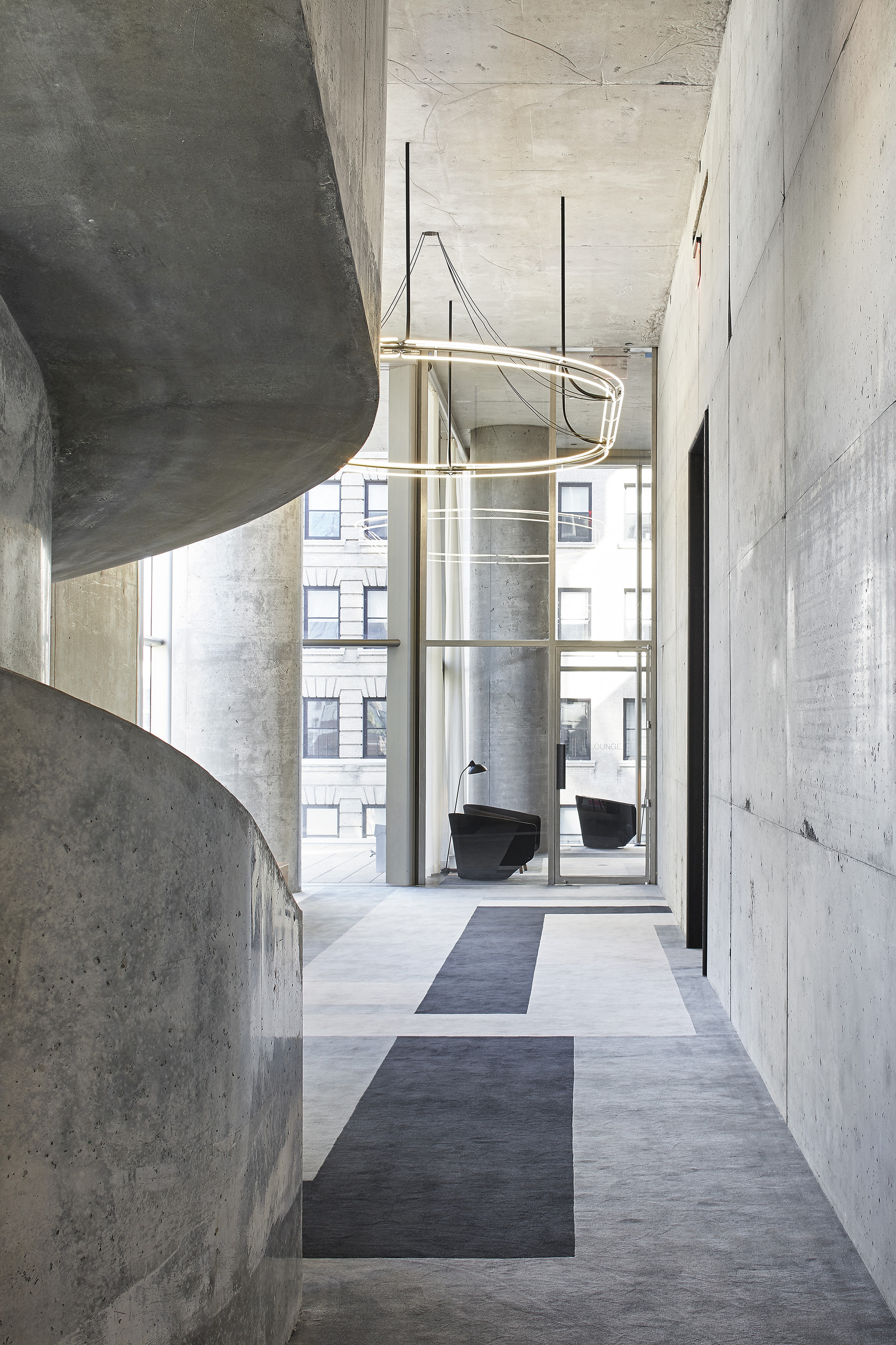 Interior column and glass detail framing the skyline